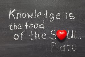 A quote from Plato which reads 'knowledge is the food of the soul' (illustrating the Young Thinkers Summer School)